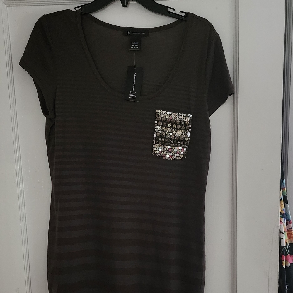 Ladies Shirt. INC. Color is "Shadow Stripe"  Size. Large